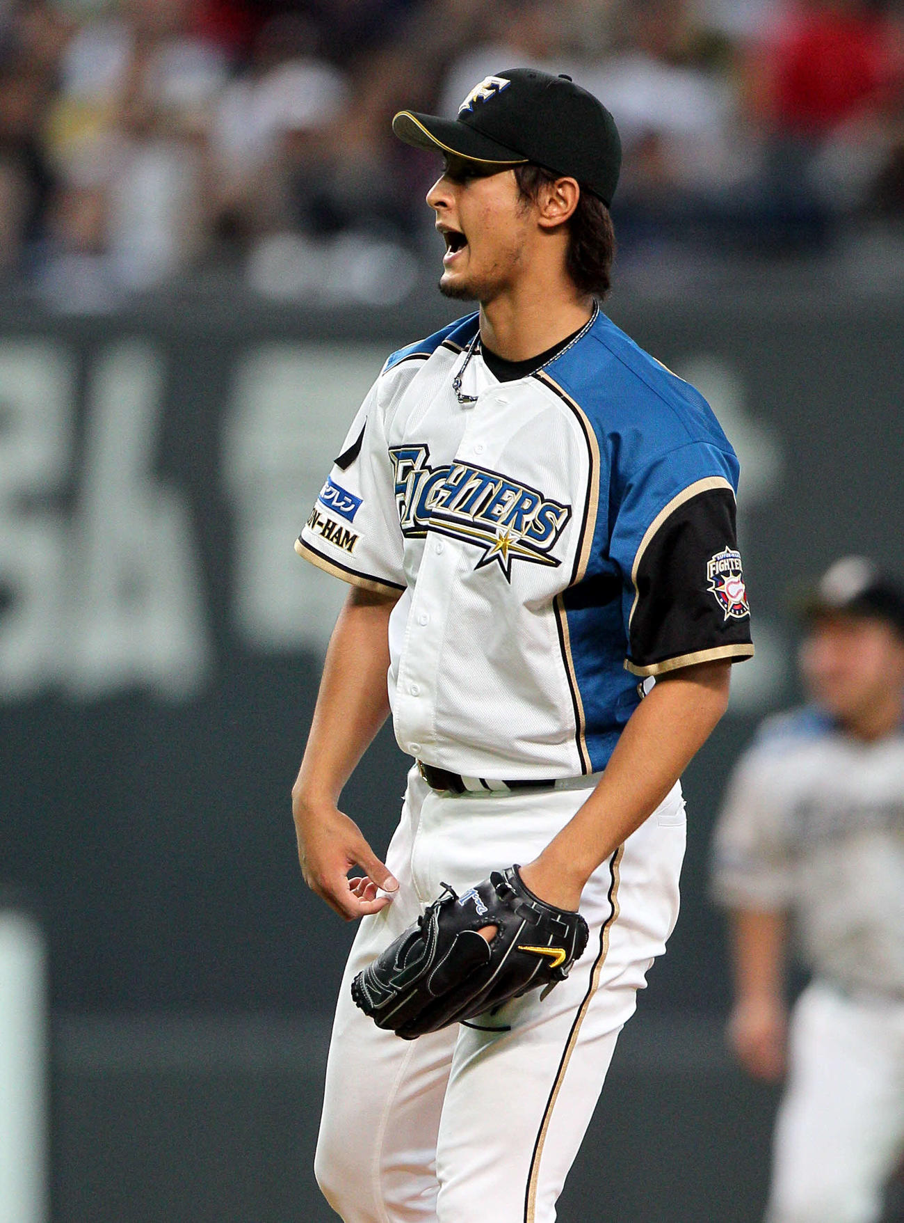 11年4月12日　5年連続の開幕マウンドで雄たけびをあげる日本ハム・ダルビッシュ