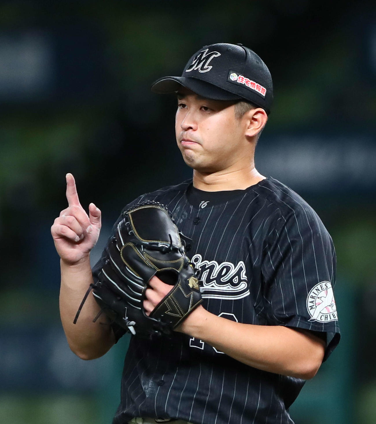 西武対ロッテ　7回裏西武無死、山川を遊飛に仕留め、表情を引き締める種市（撮影・足立雅史）