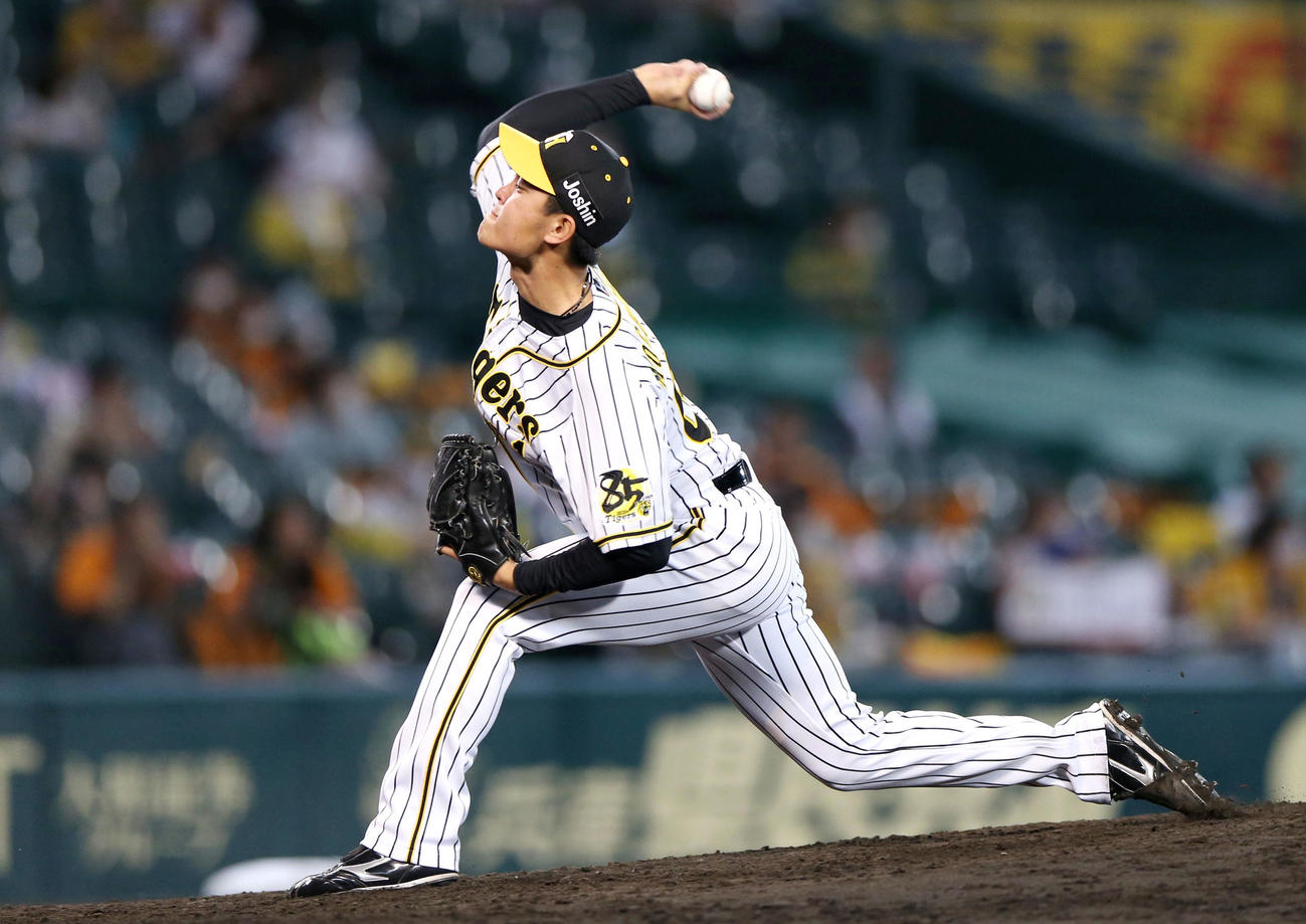 阪神対巨人　7回、阪神3番手で登板の望月（撮影・上山淳一）