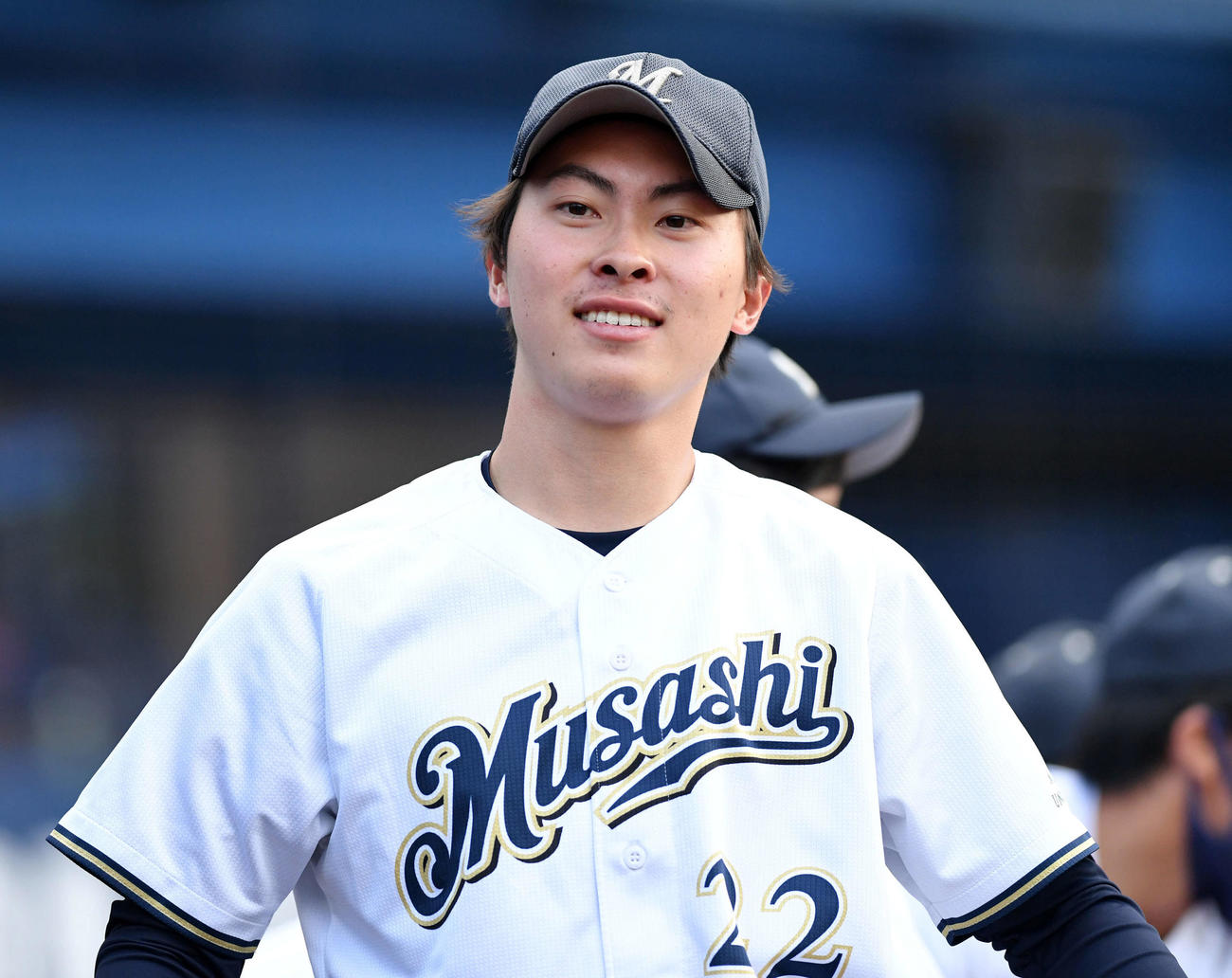 神奈川大対武蔵大　試合に勝利し笑顔を見せる武蔵大・高津（撮影・滝沢徹郎）
