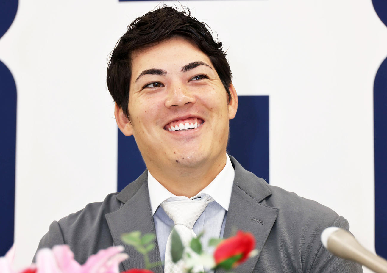 契約更改した広島九里（撮影・加藤孝規）
