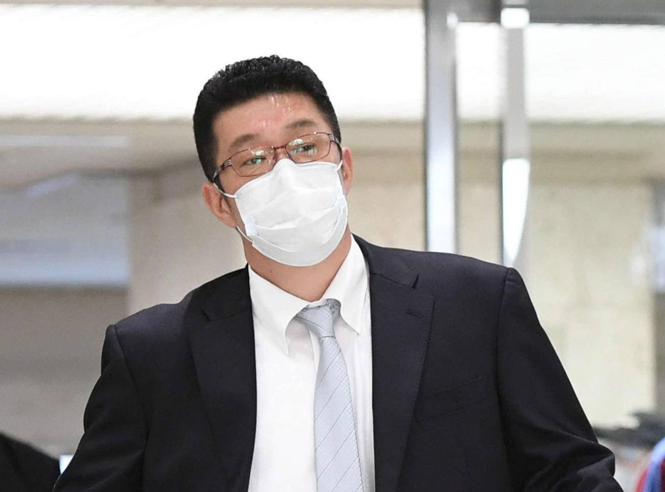那覇空港に到着した佐々岡監督