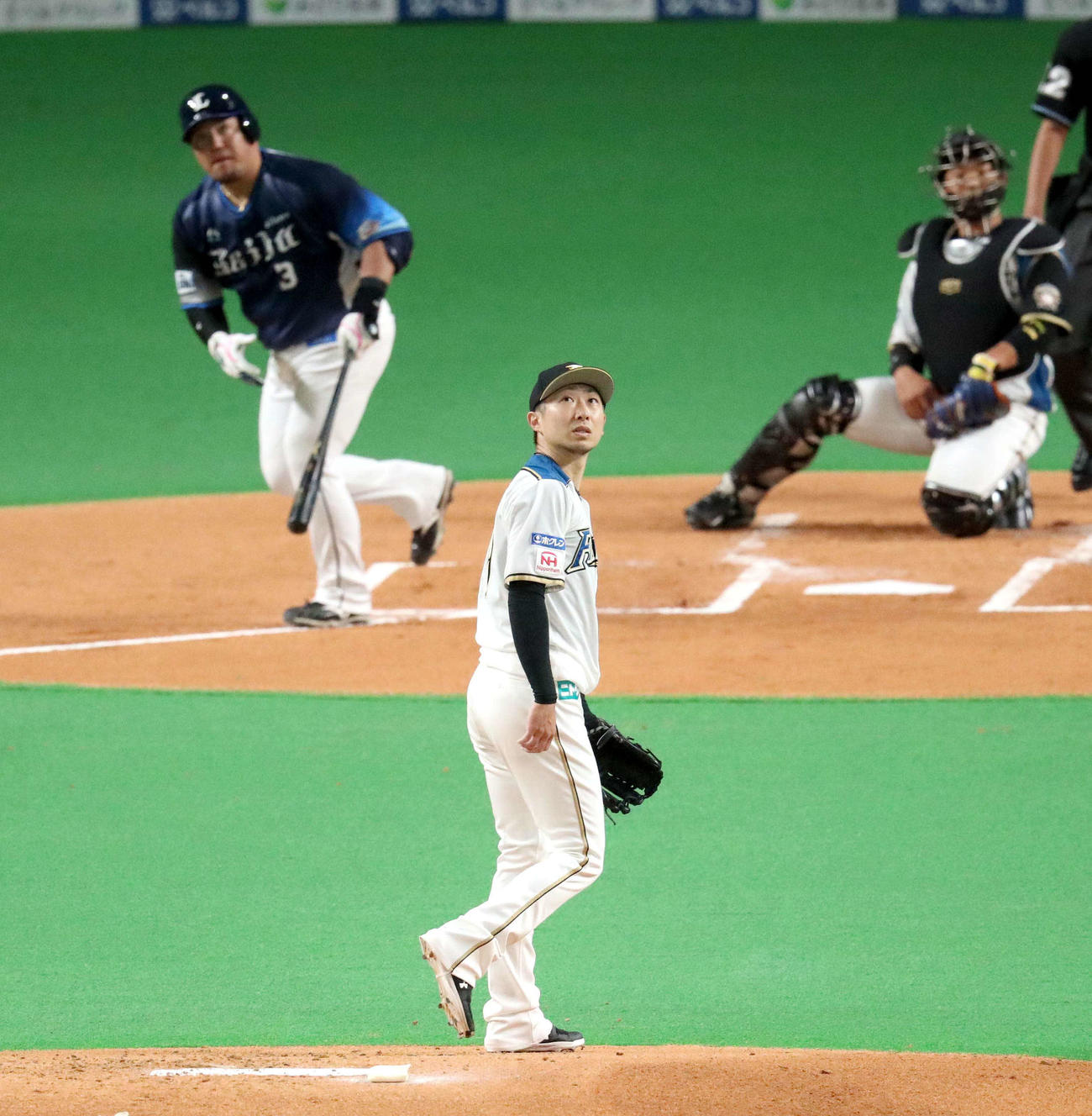 日本ハム対西武　1回表西武無死二、三塁、山川に中越え3点本塁打を浴びる日本ハム金子（撮影・佐藤翔太）