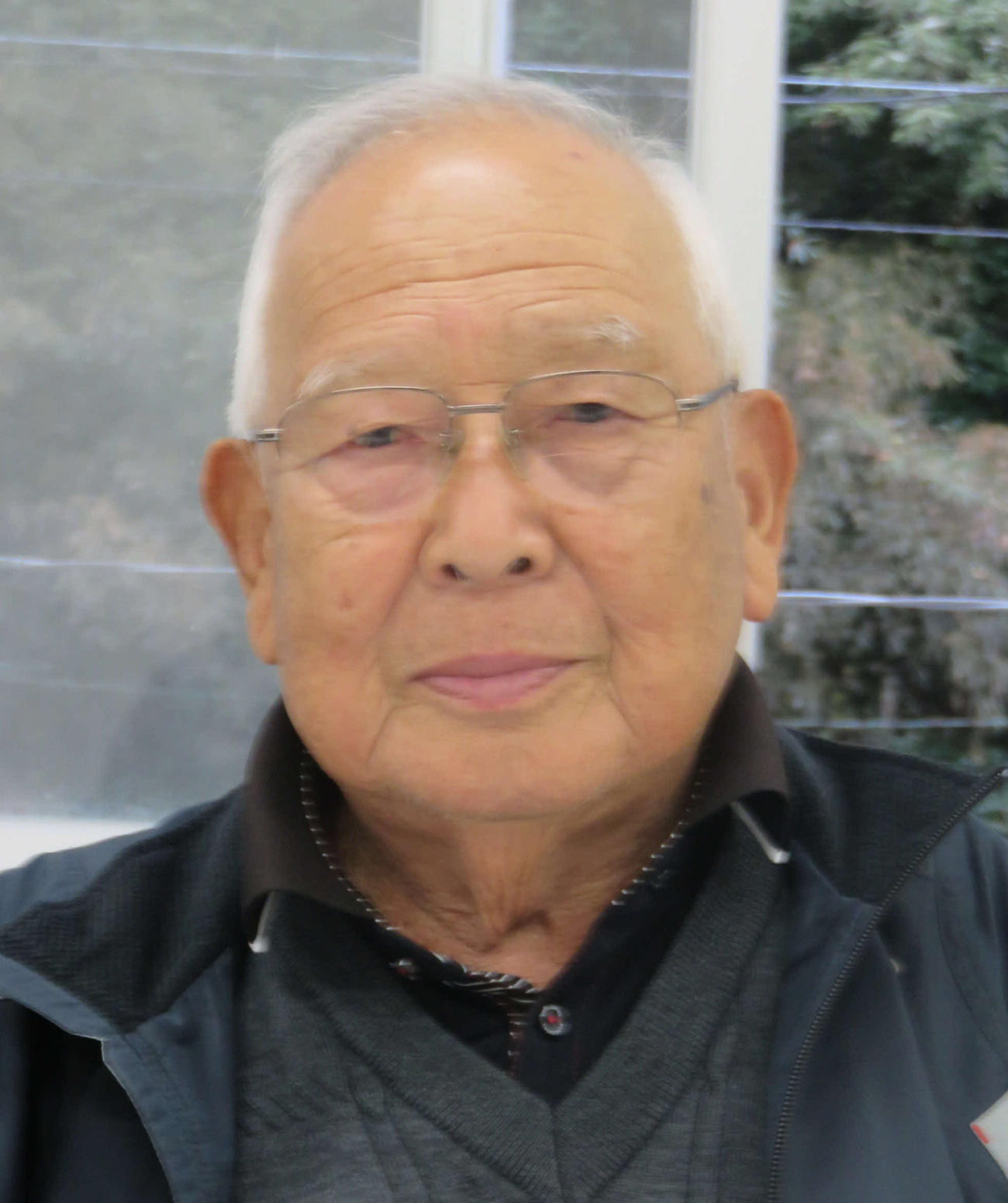 上田氏の高校後輩・谷口良一氏