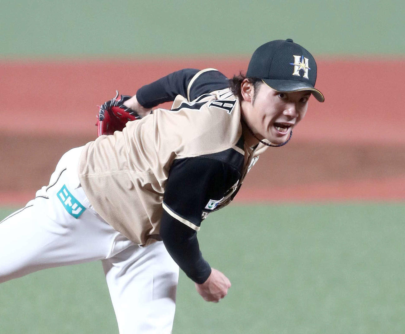 西武対日本ハム　叫びながら力投する伊藤（撮影・黒川智章）