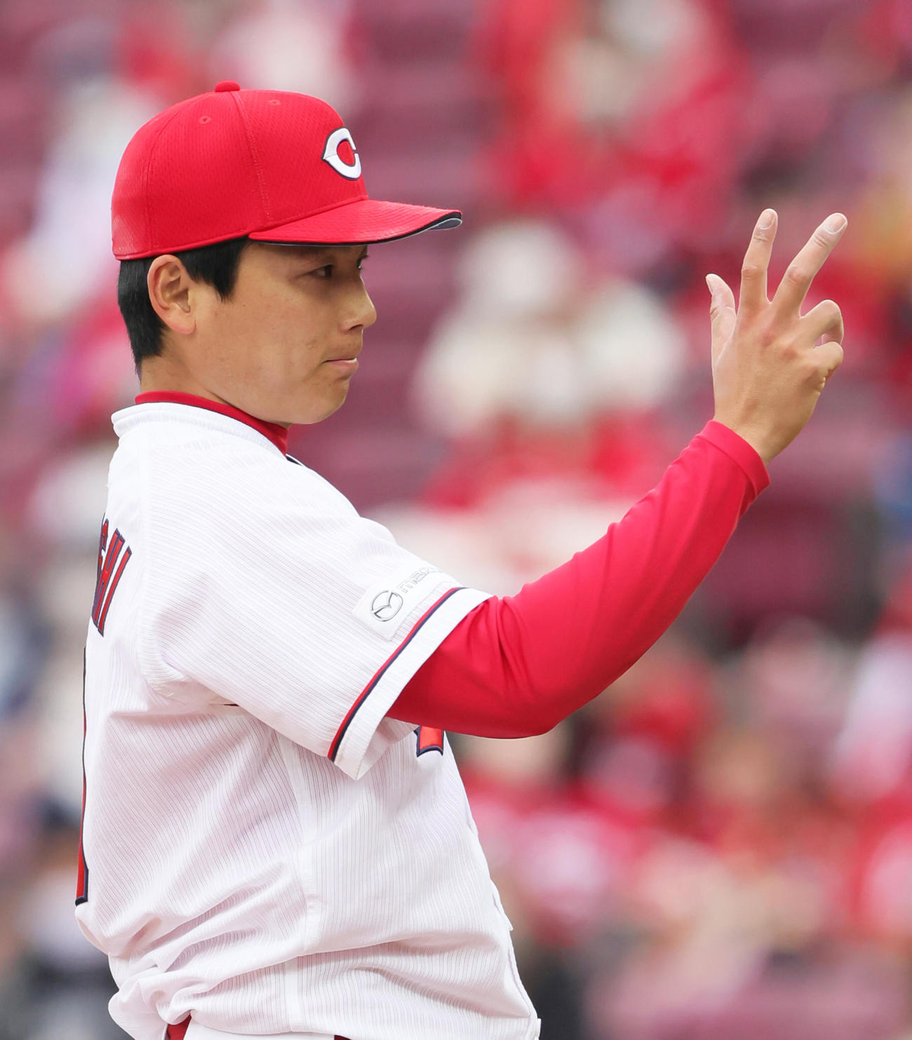 広島対巨人　初登板からの連続無失点を14試合とした広島栗林（撮影・足立雅史）