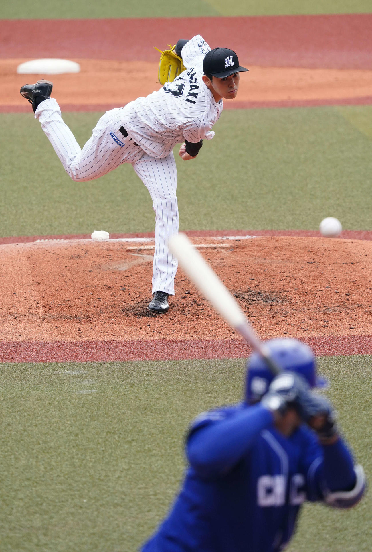 3月、中日とのオープン戦で力投するロッテ佐々木朗（2021年3月12日）