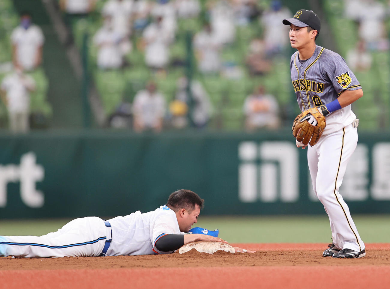 西武対阪神　7回裏西武1死満塁、愛斗の左犠飛で三塁走者が生還も二塁走者山川が走塁死となる（撮影・清水貴仁）