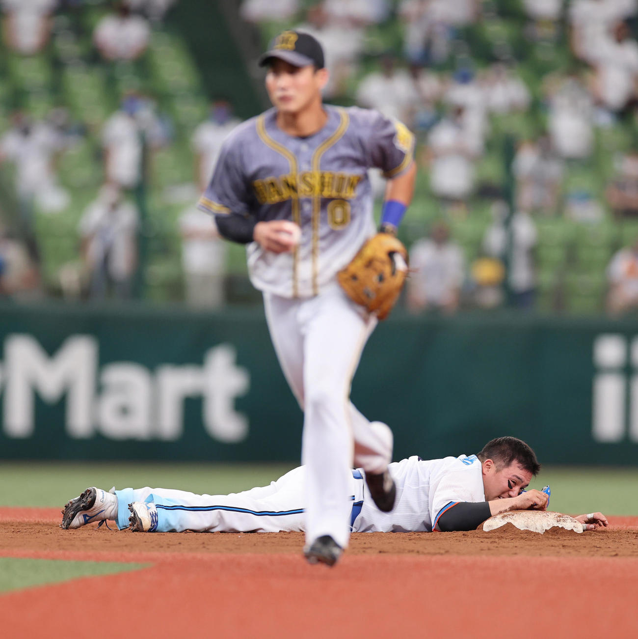 西武対阪神　7回裏西武1死満塁、愛斗の左犠飛で三塁走者が生還も二塁走者山川が走塁死となる（撮影・清水貴仁）