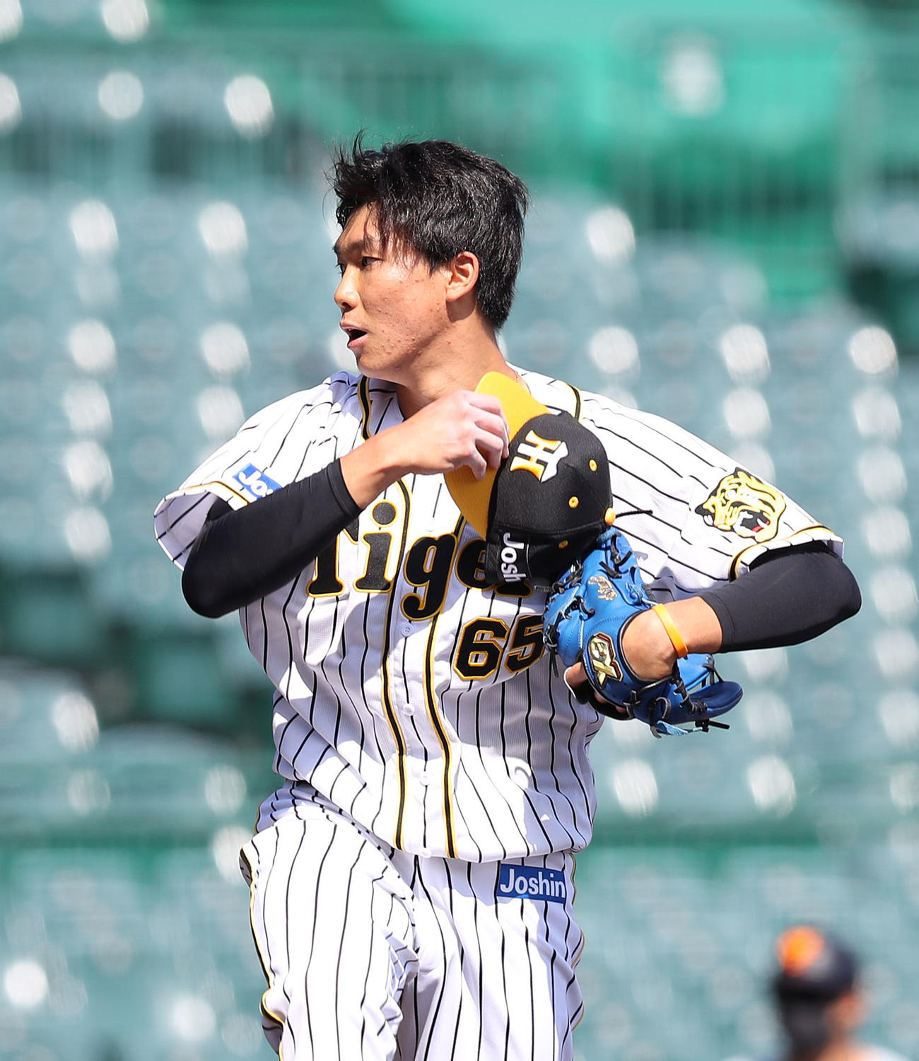 ウエスタンリーグ阪神対巨人　7回表から4番手で登板する湯浅京己（撮影・白石智彦）