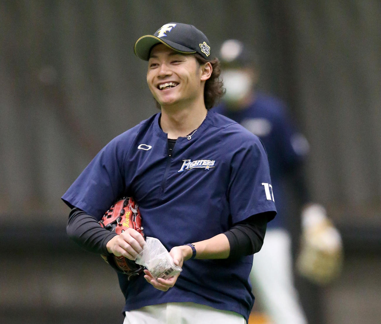 笑顔を見せる日本ハム伊藤（代表撮影）