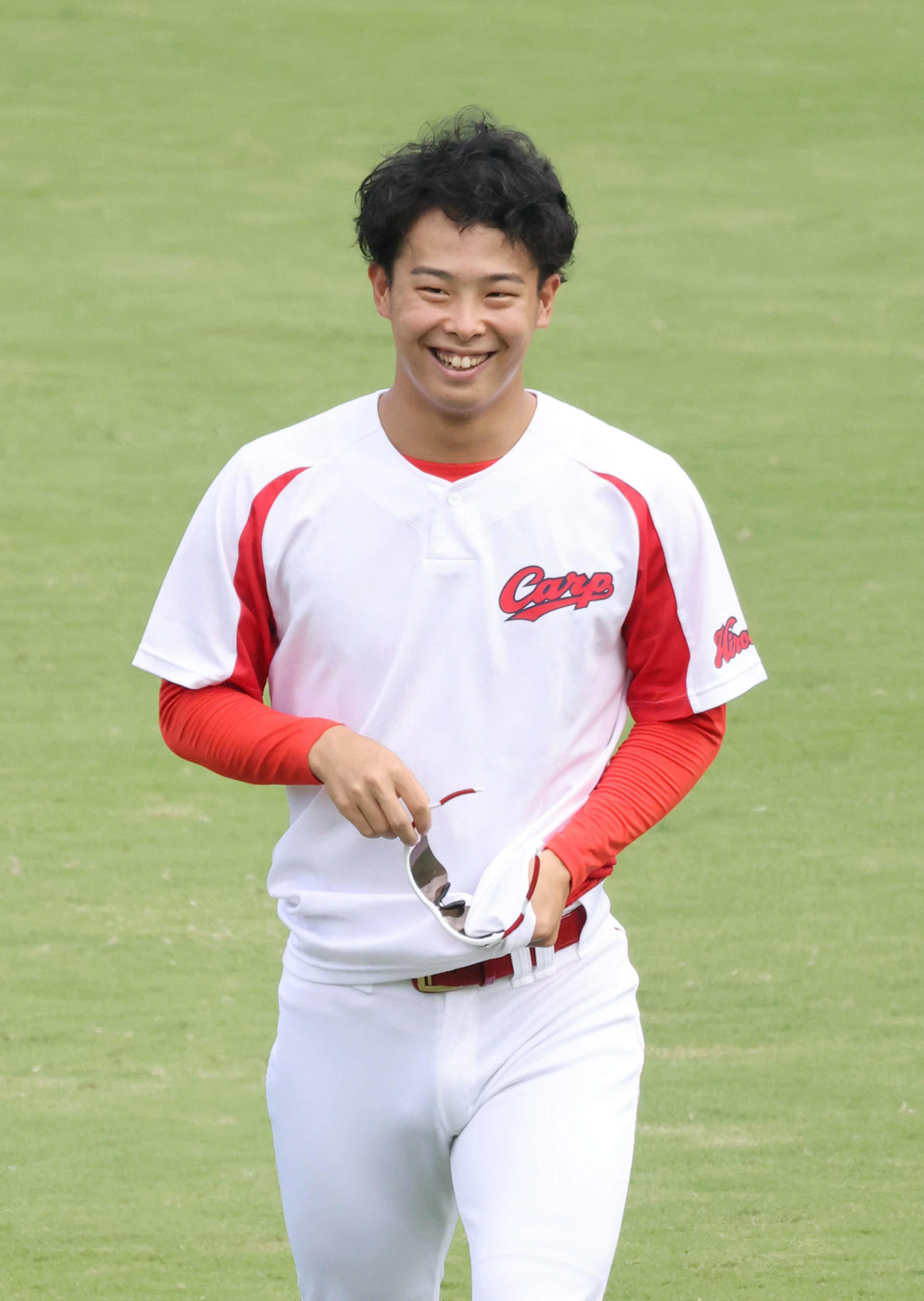 広島投手指名練習　笑顔の玉村（撮影・加藤孝規）