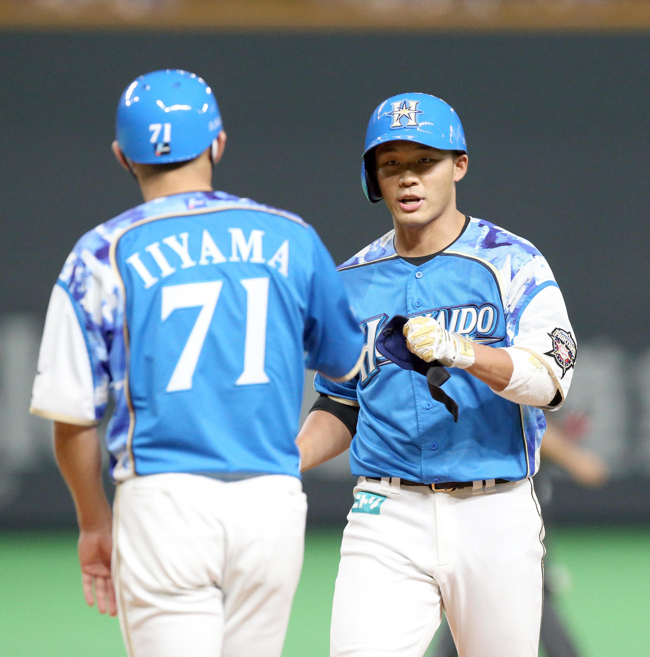 日本ハム対ソフトバンク　2回裏日本ハム1死一、三塁、王柏融は中前適時打を放つ（撮影・佐藤翔太）