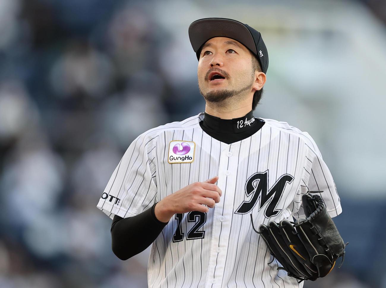 ロッテ対日本ハム　8回表日本ハムの攻撃を無失点に抑えほっとした表情を見せる石川（撮影・垰建太）