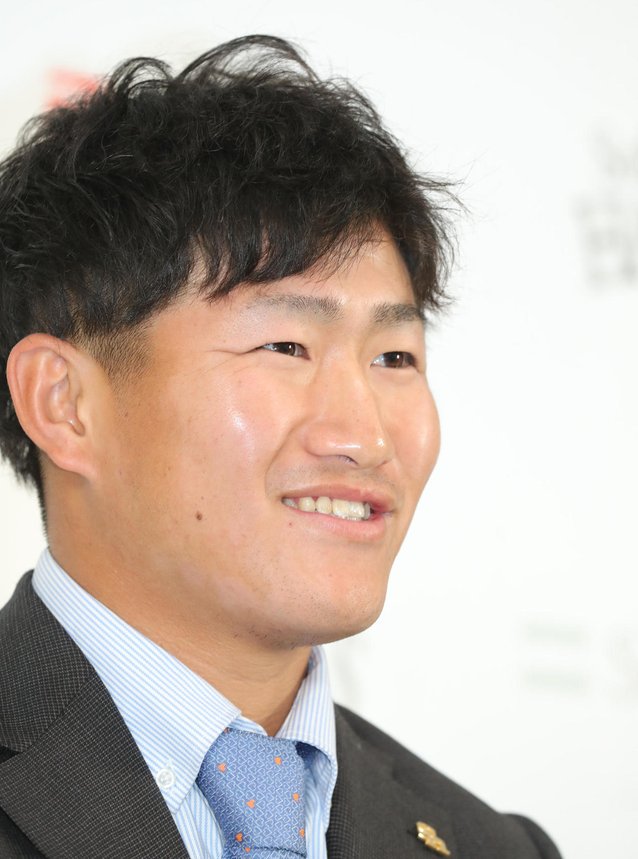 契約更改を終え、笑顔を見せる野村大樹（撮影・梅根麻紀）