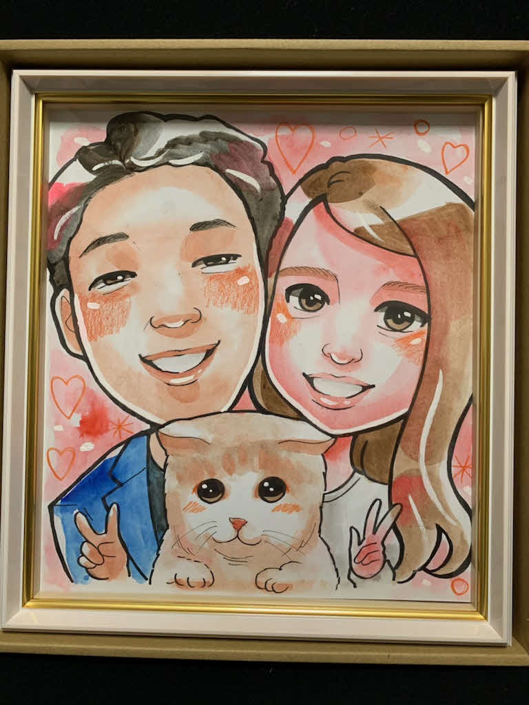 作家マナムさんが描いた阪神大山と愛妻梨子さん、愛猫ラテの似顔絵