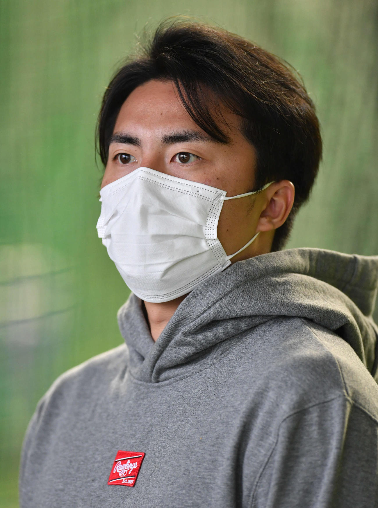 囲み取材を受ける田中正（撮影・岩下翔太）