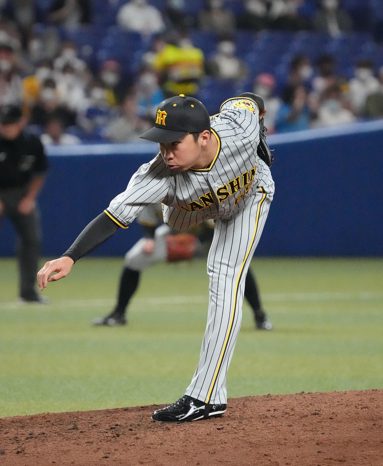中日対阪神　7回裏、阪神4番手で登板する石井（撮影・森本幸一）