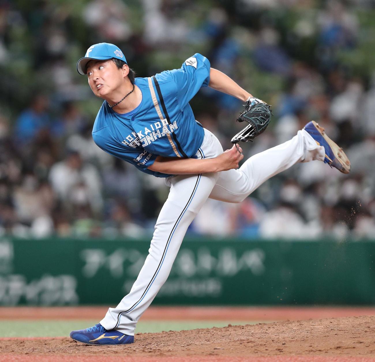 西武対日本ハム　7回に登板の石川直（撮影・黒川智章）