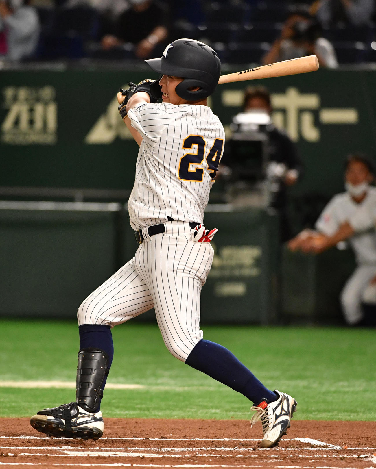 東日本国際大対静岡大　1回裏東日本国際大1死、佐々木優征は右中間に本塁打を放つ（撮影・柴田隆二）