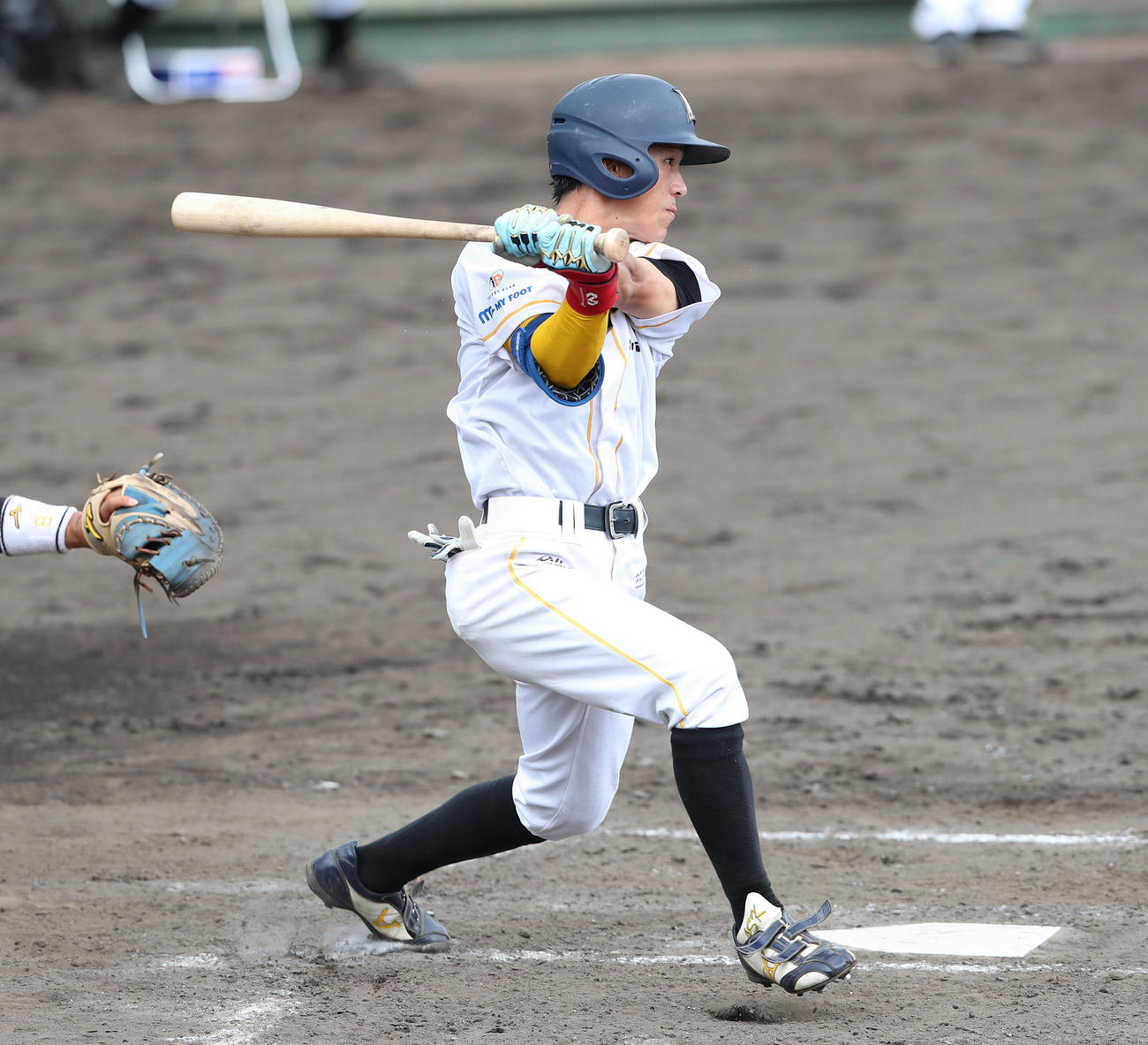練習試合阪神対日本海オセアンリーグ選抜　5回表日本海オセアンリーグ選抜2死三塁、熊谷宥晃は中越え適時三塁打を放つ（撮影・白石智彦）