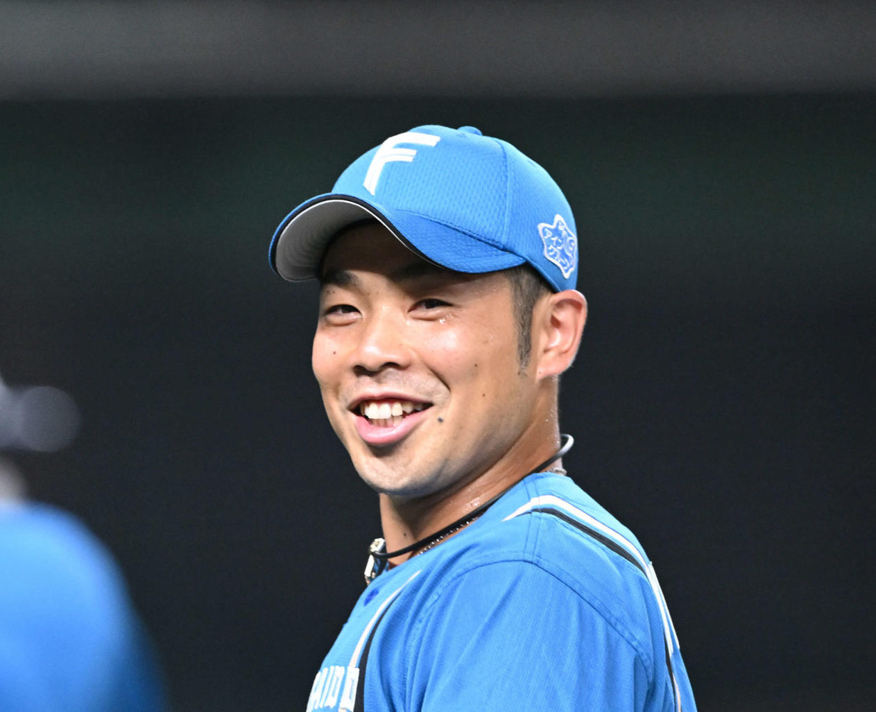 笑顔でベンチへ引き揚げる日本ハム近藤健介（2022年6月28日撮影）