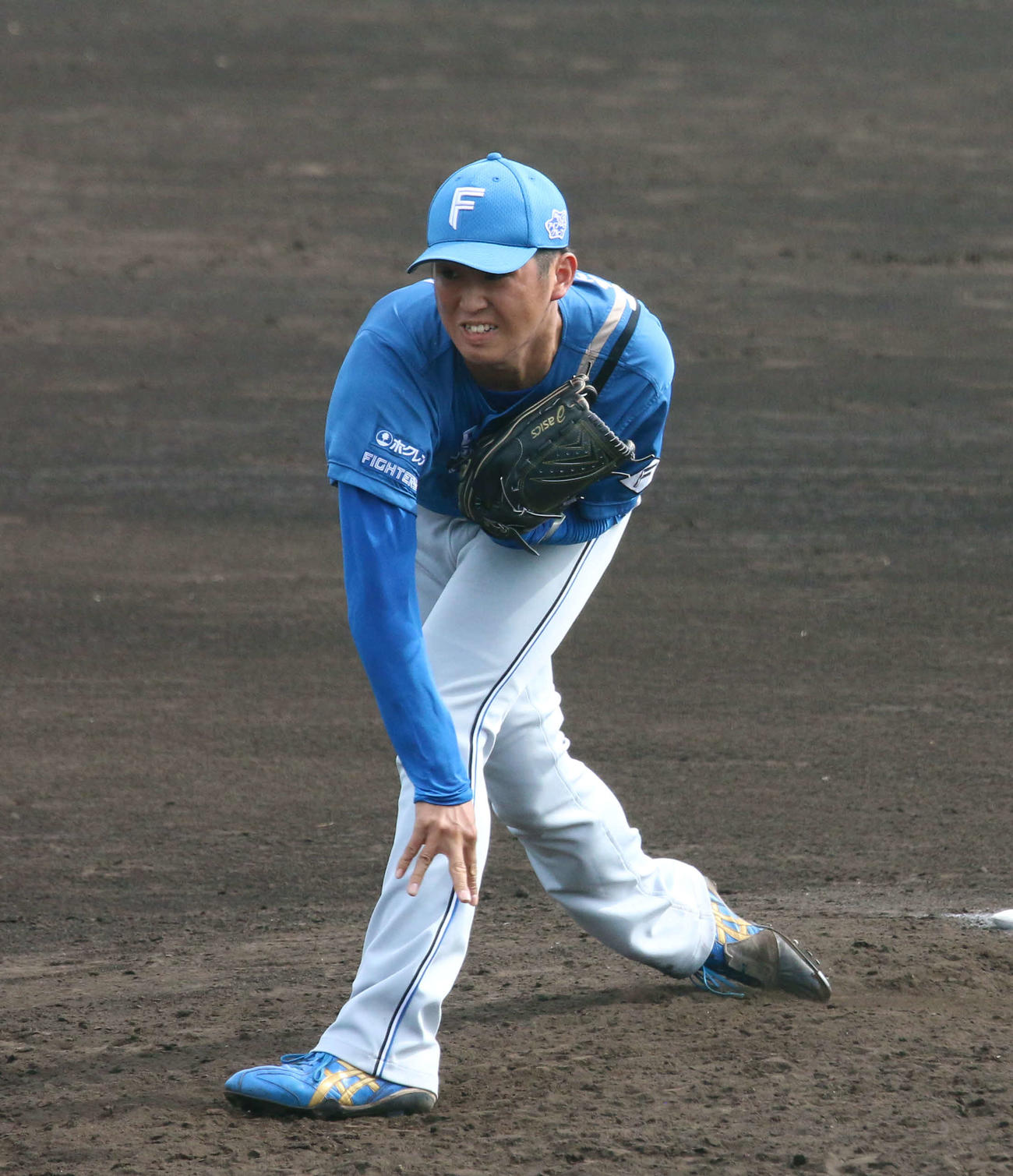 フェニックスリーグ・ヤクルト戦で5回に登板し、3者凡退で抑えた日本ハム松本遼（撮影・木下大輔）