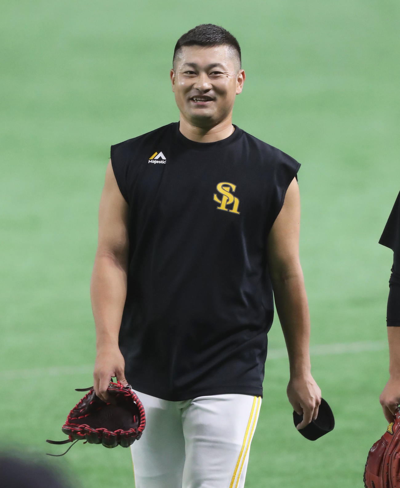 全体練習を終え、笑顔で引き揚げる森（撮影・屋方直哉）