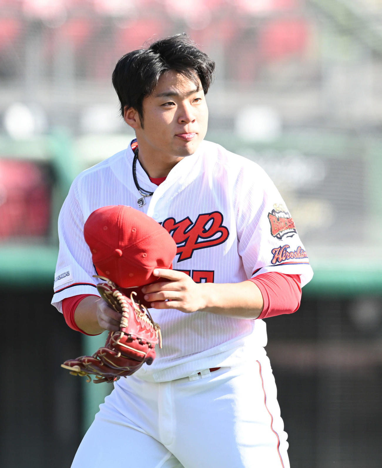 投球を終え引き揚げる広島田中法（撮影・滝沢徹郎）
