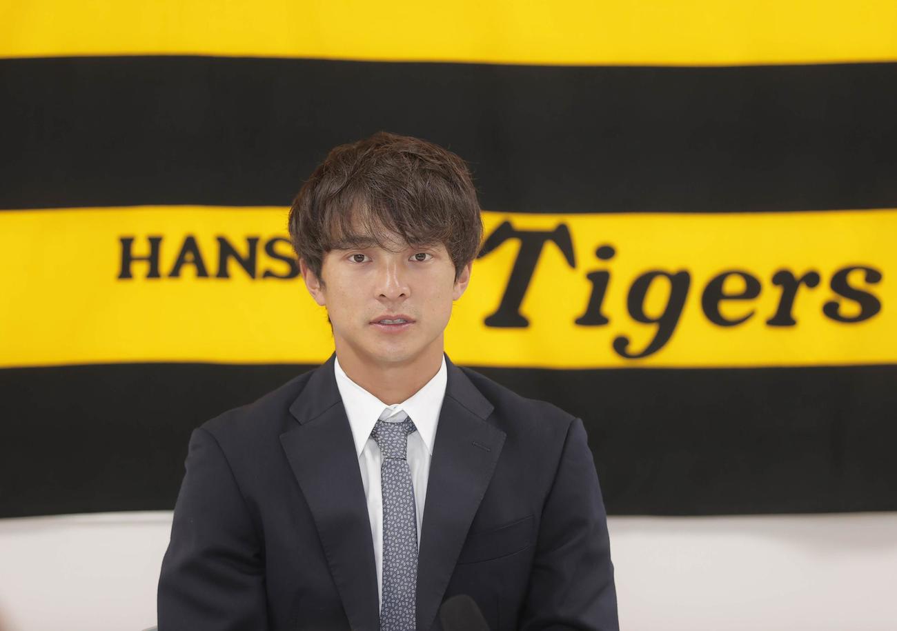 契約更改を終え会見に臨む阪神熊谷敬宥（代表撮影）