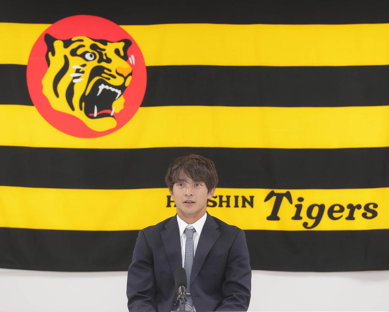 契約更改を終え会見に臨む阪神熊谷敬宥（代表撮影）