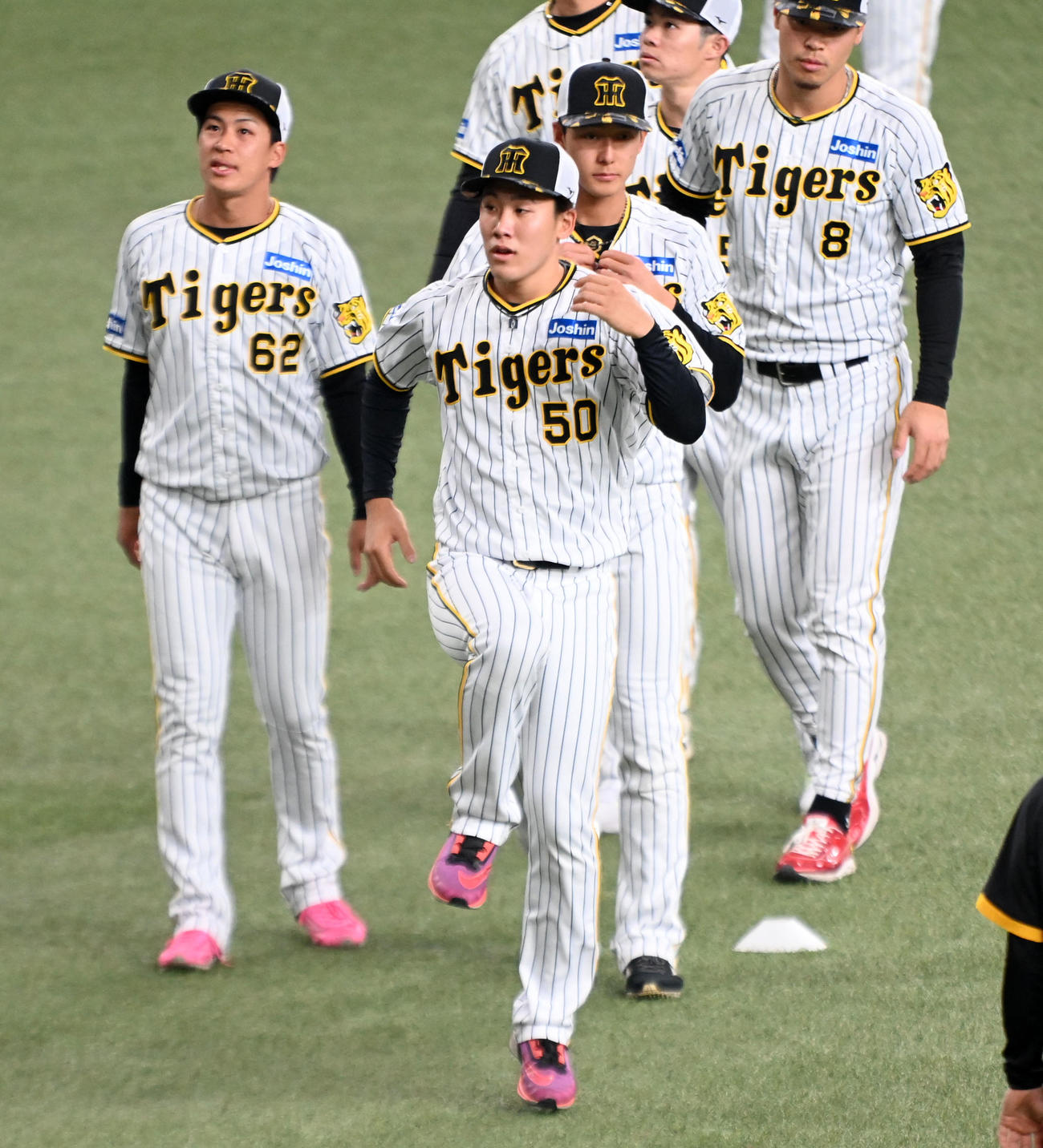 軽快にアップを行う富田（撮影・前岡正明）