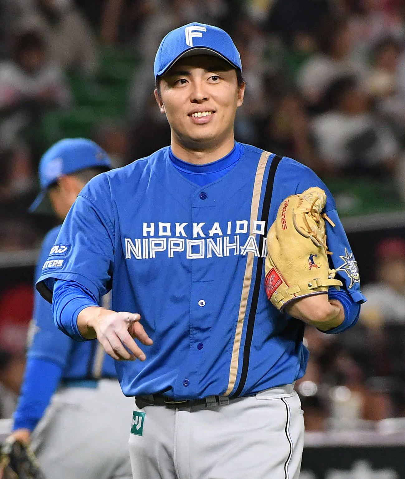 ソフトバンク対日本ハム　8回裏ソフトバンク1死、牧原大を中飛に抑え、笑顔を見せる田中正（撮影・岩下翔太）
