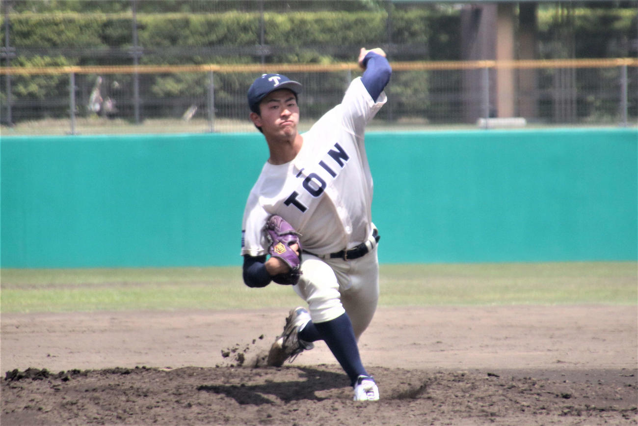 桐蔭横浜対横浜国大　8回を投げ7安打2失点に抑えた桐蔭横浜先発の古謝（撮影・保坂淑子）