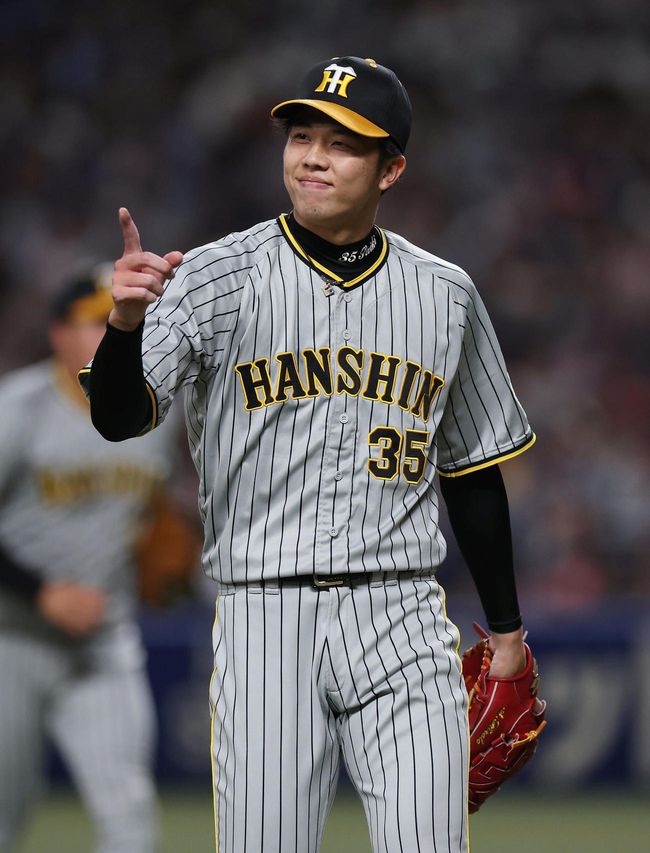 中日対阪神　ピンチを切り抜け笑顔を見せる才木（2023年4月23日撮影）