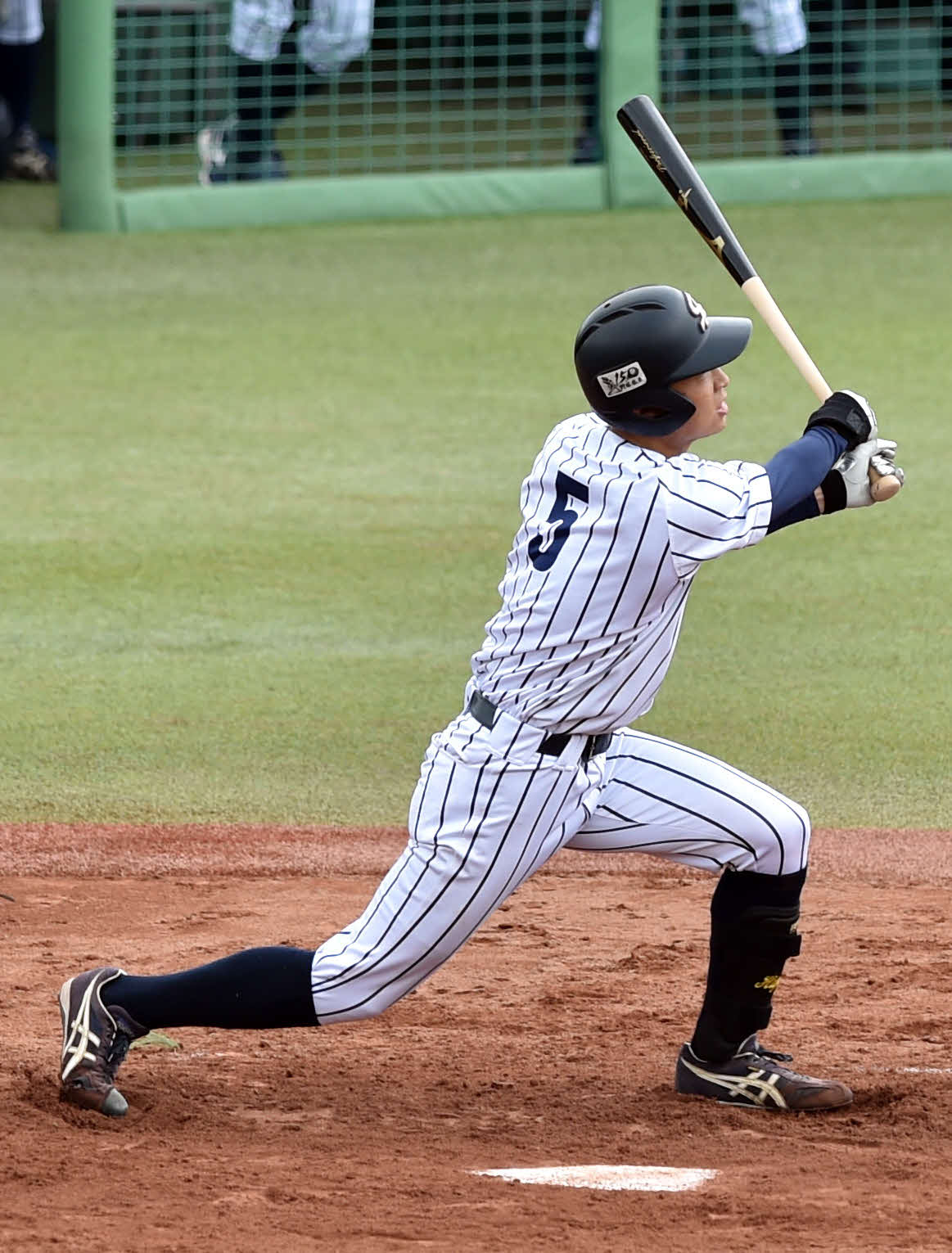 仙台大対東北福祉大　4回表仙台大1死一、三塁、先制適時二塁打を放つ伊藤（撮影・相沢孔志）