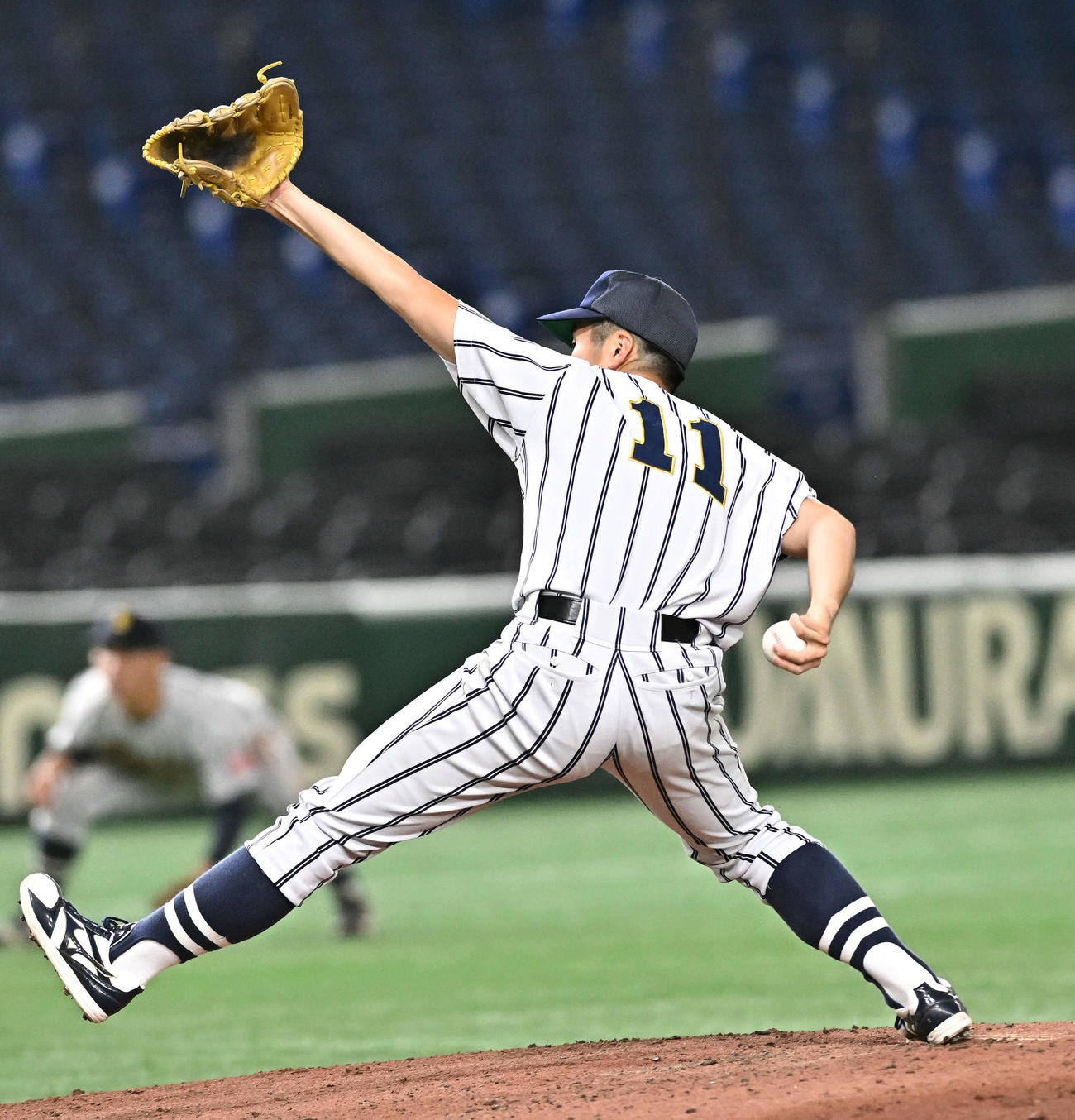 国際武道大対広島経大　力投する国際武道大先発の山口（撮影・滝沢徹郎）