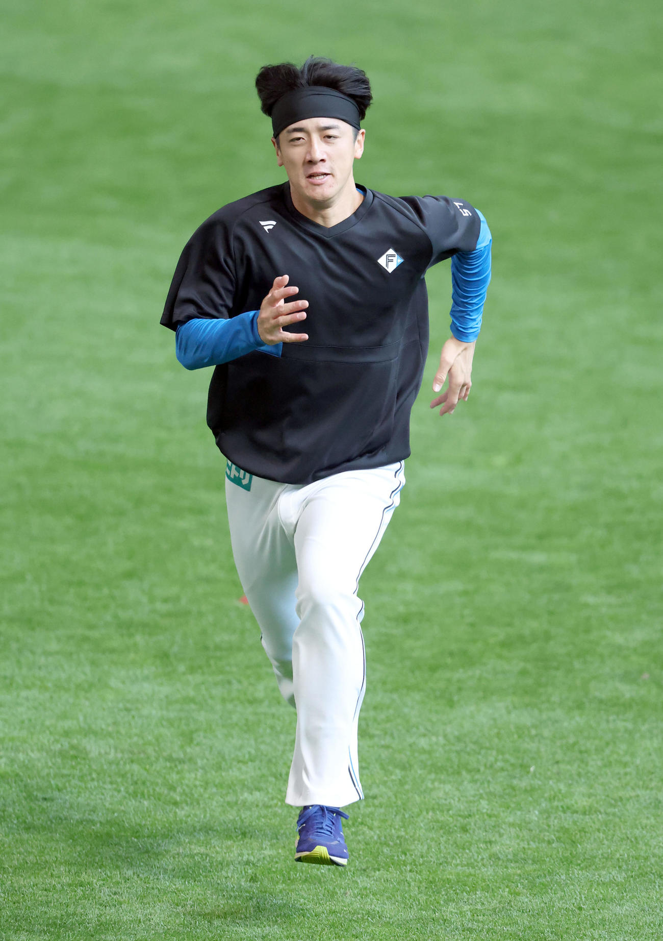 日本ハム対阪神　試合前、ランニングをする日本ハム北山（撮影・佐藤翔太）