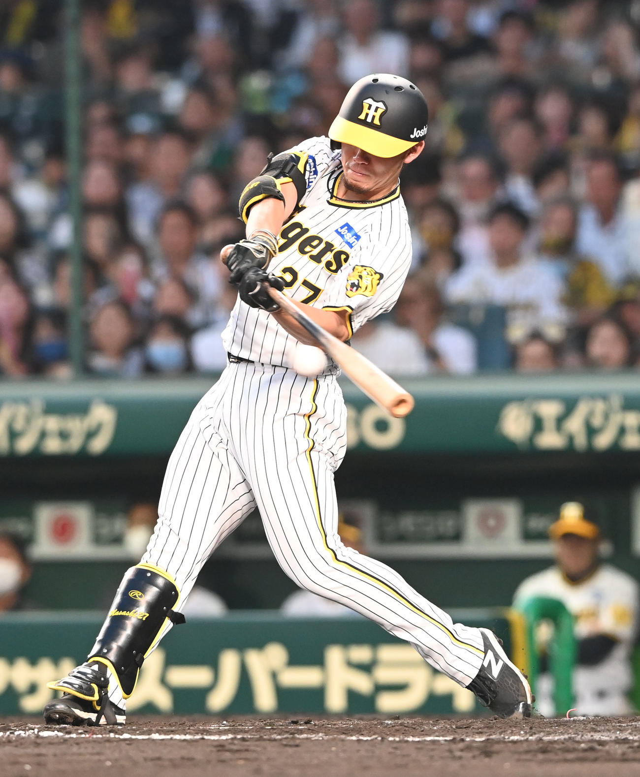 阪神対オリックス　4回裏阪神2死二、三塁、左前適時打を放つ伊藤将（撮影・和賀正仁）