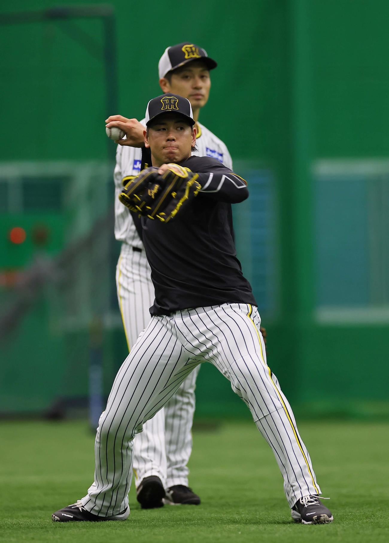 ノックを受ける梅野（撮影・上田博志）