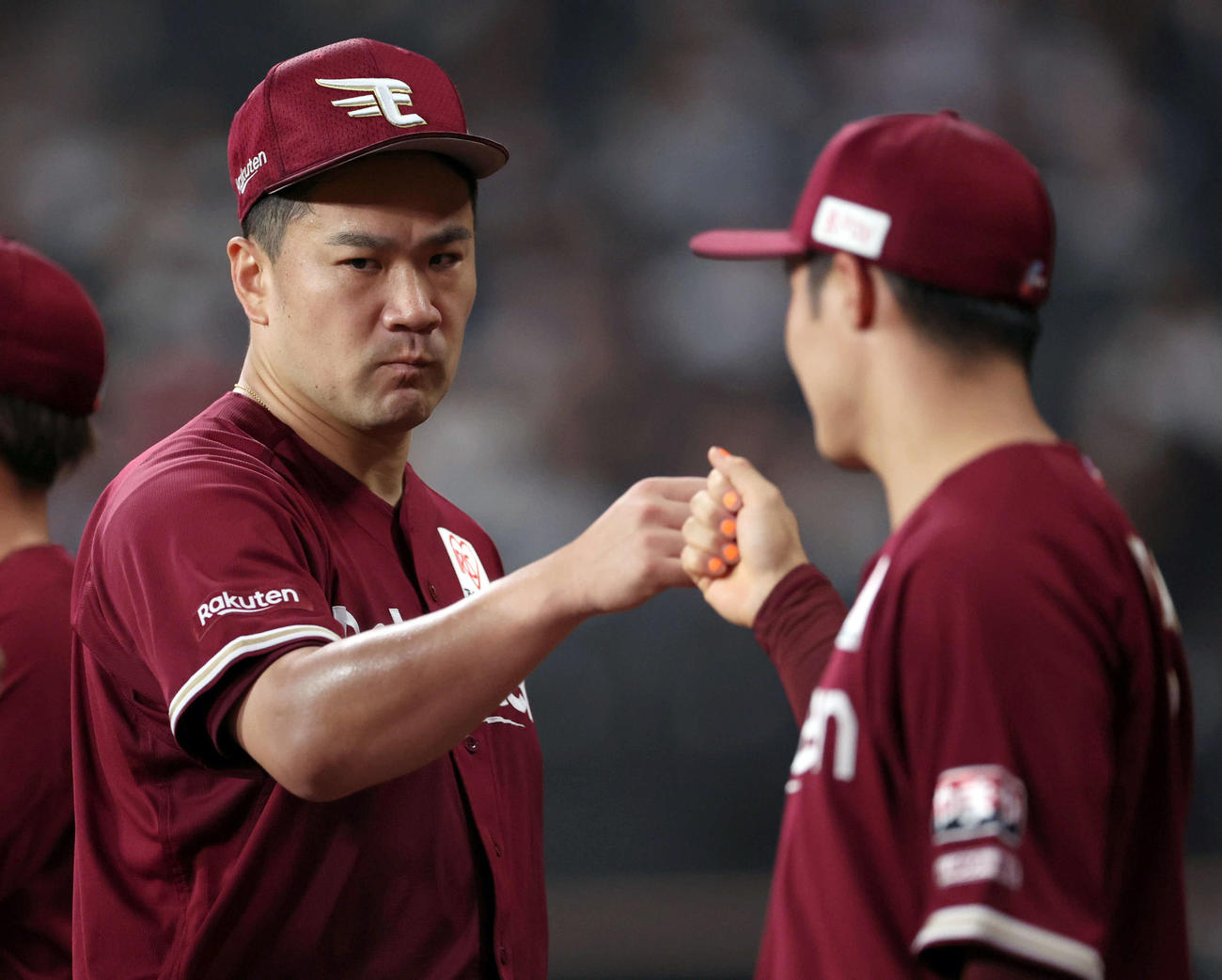 日本ハム対楽天　6回裏を無失点に抑えベンチに戻る田中将（撮影・佐藤翔太）