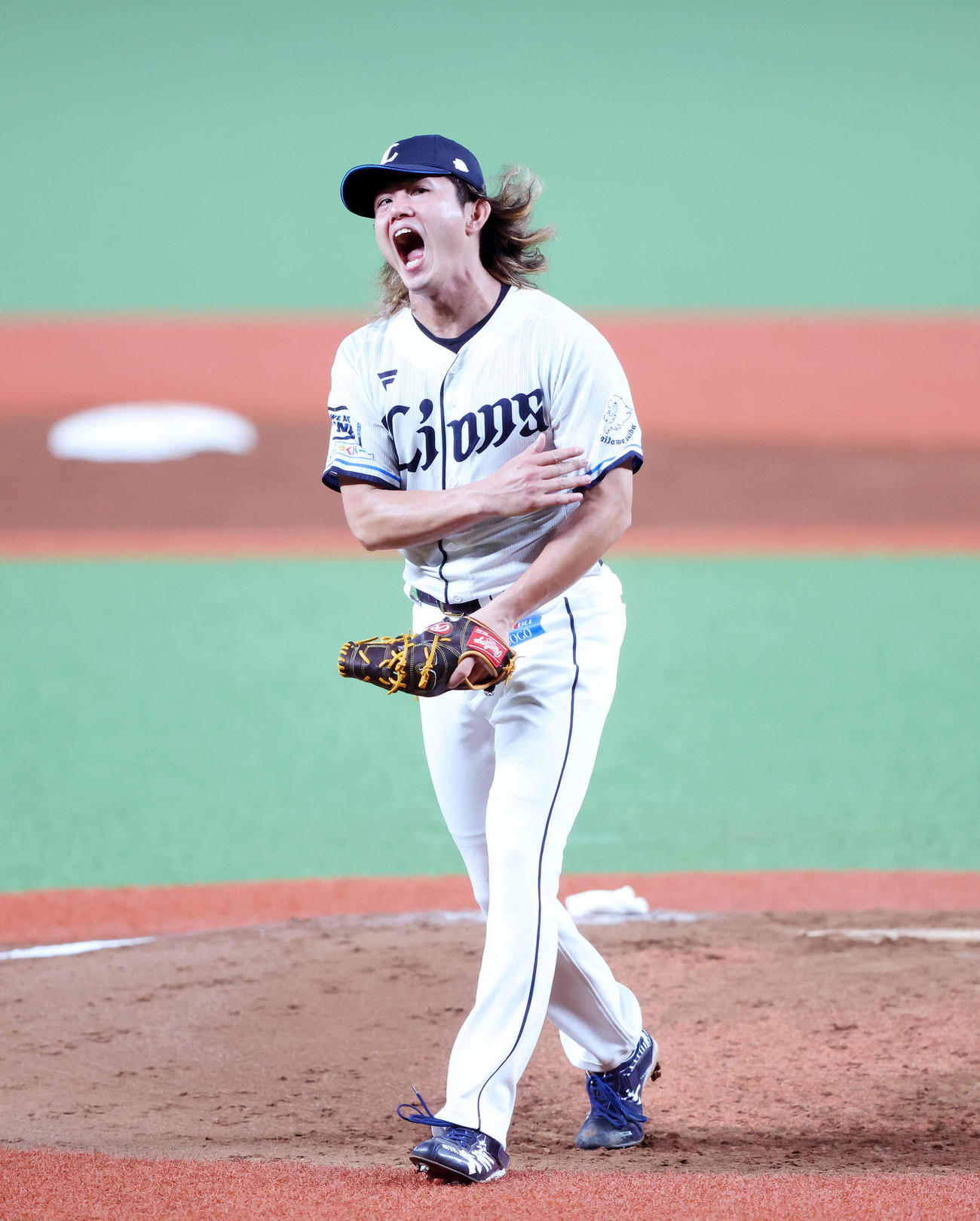 7回表、楽天の攻撃を抑え雄たけびを上げる西武今井（撮影・鈴木正人）