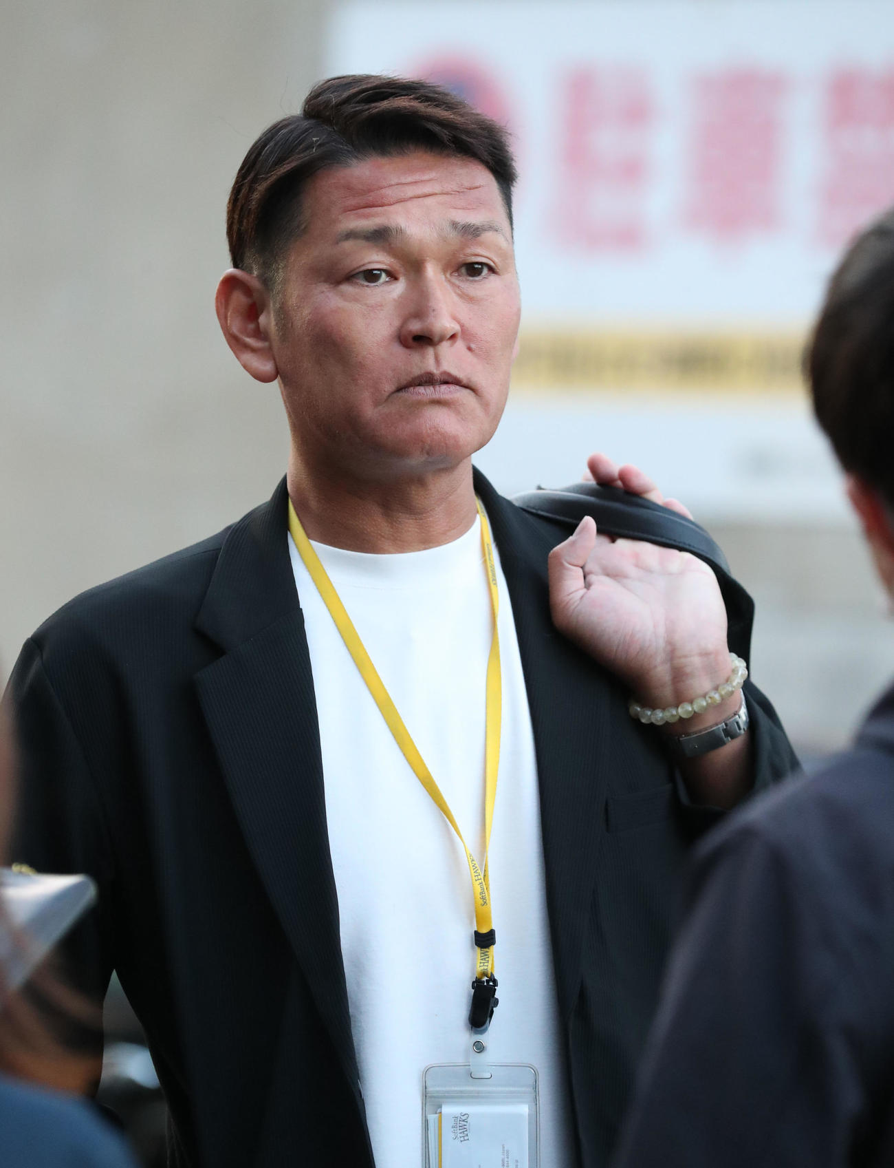 会議を終え引きあげる永井スカウト部部長（撮影・梅根麻紀）