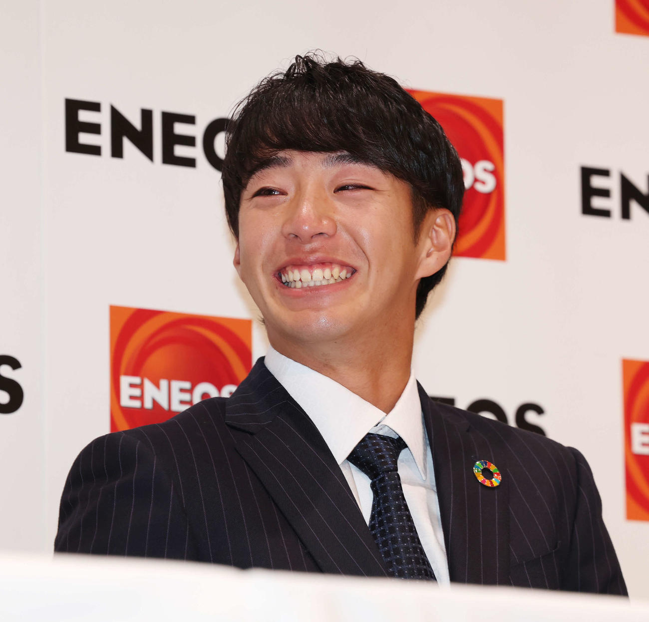 DeNAから1位指名を受け笑顔を見せるENEOS・度会（撮影・宮地輝）
