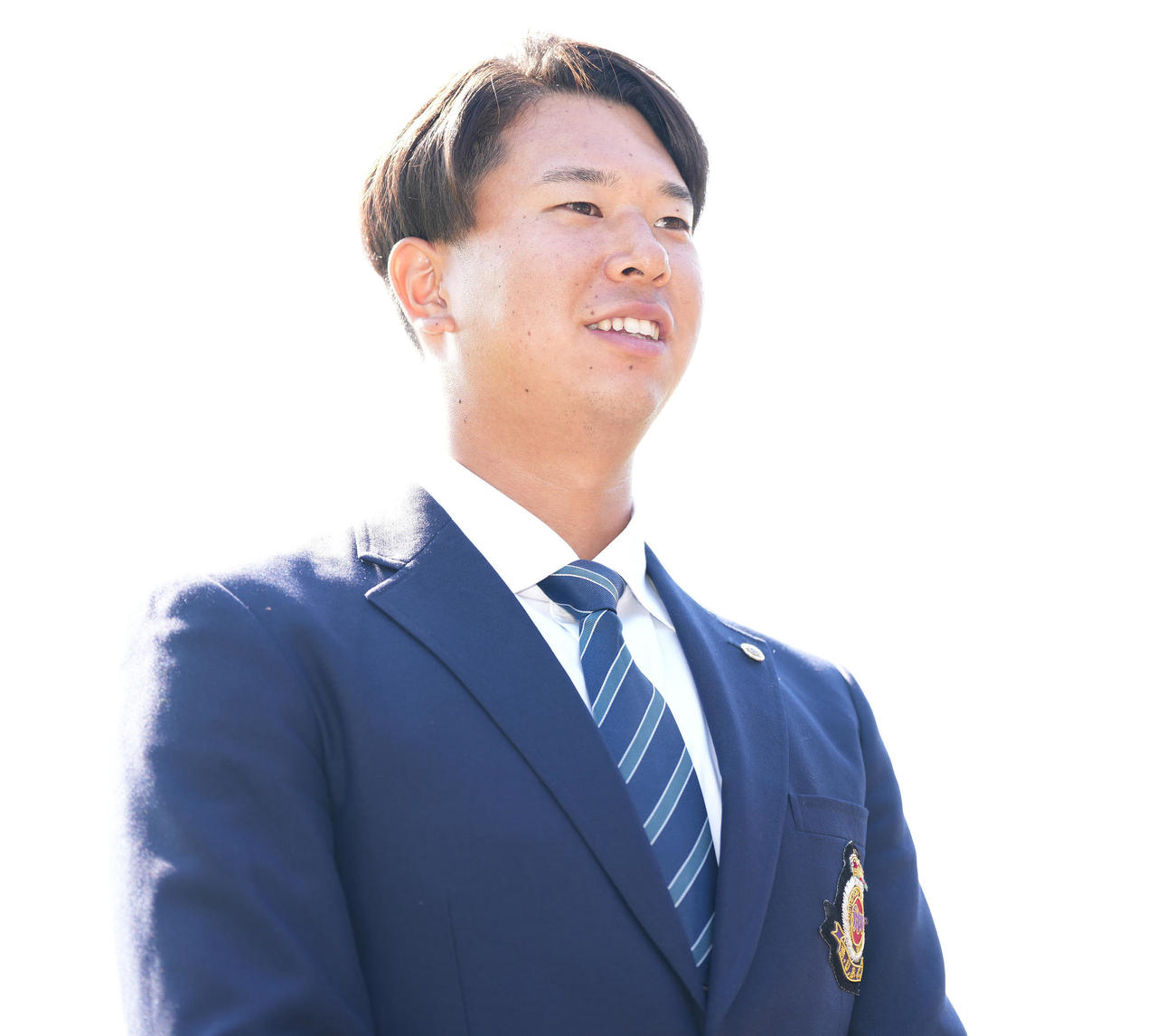 ロッテ指名あいさつ　ロッテドラフト1位の明大・上田は指名あいさつ後、囲み取材に応じる（撮影・鈴木みどり）