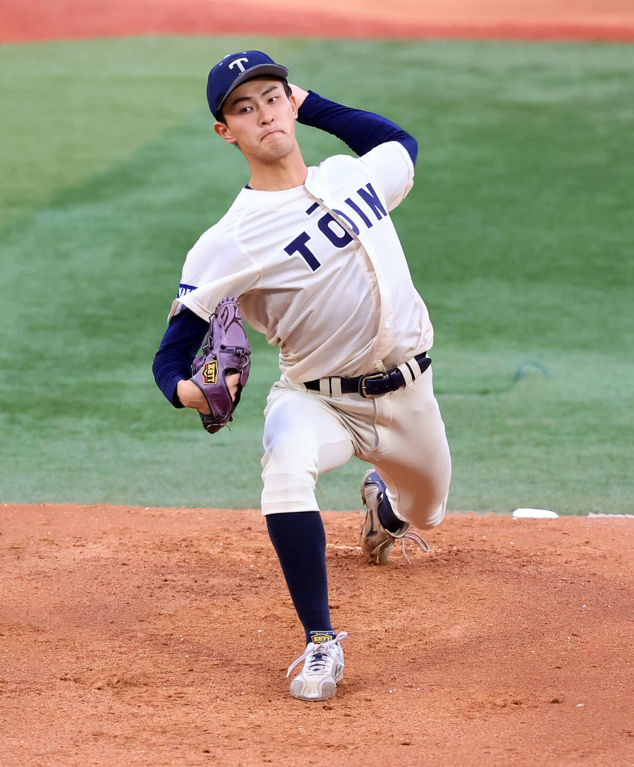 桐蔭横浜大対国際武道大　力投する桐蔭横浜大の古謝（撮影・浅見桂子）