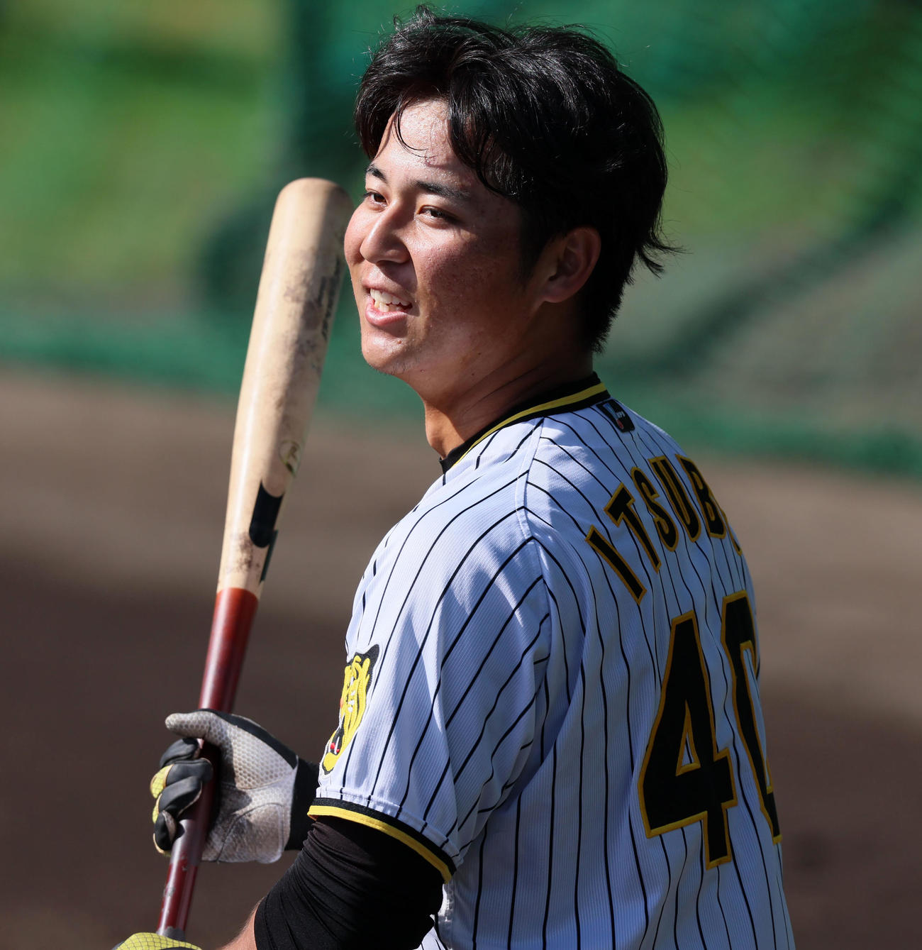 ロングティー打撃を行う井坪（撮影・加藤哉）