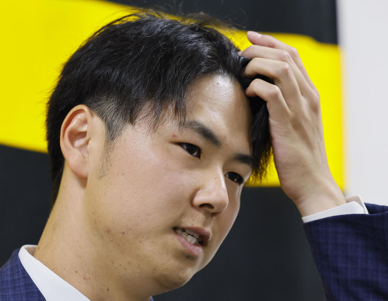 契約更改を終え、記者会見する阪神浜地真（撮影・藤尾明華）