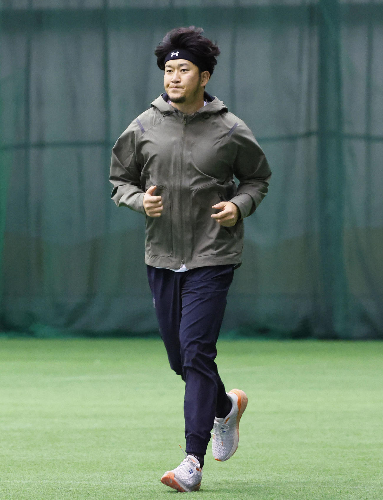阪神合同自主トレに合流し、ランニングをする岩貞（撮影・藤尾明華）