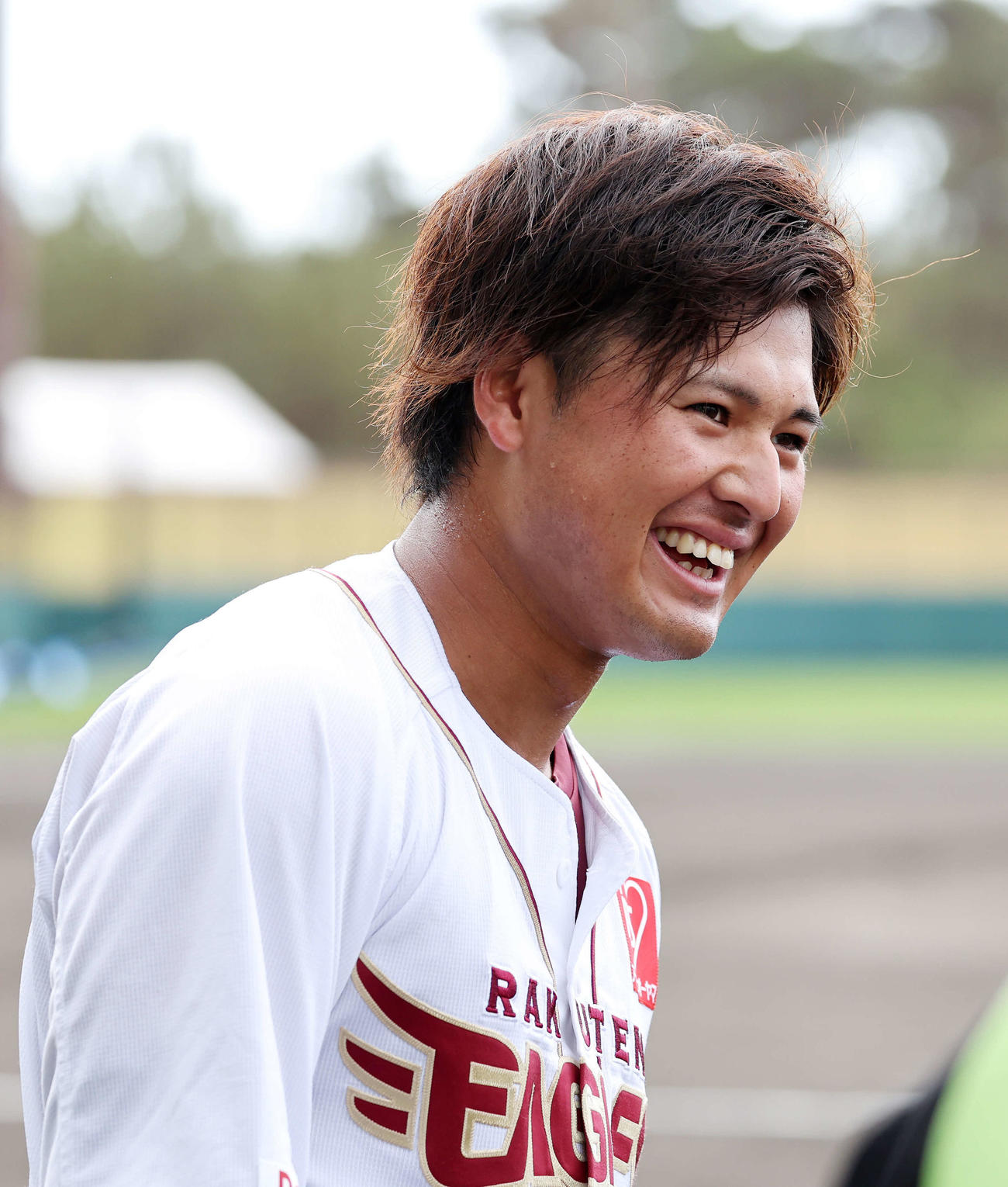 練習中、笑顔を見せる黒川